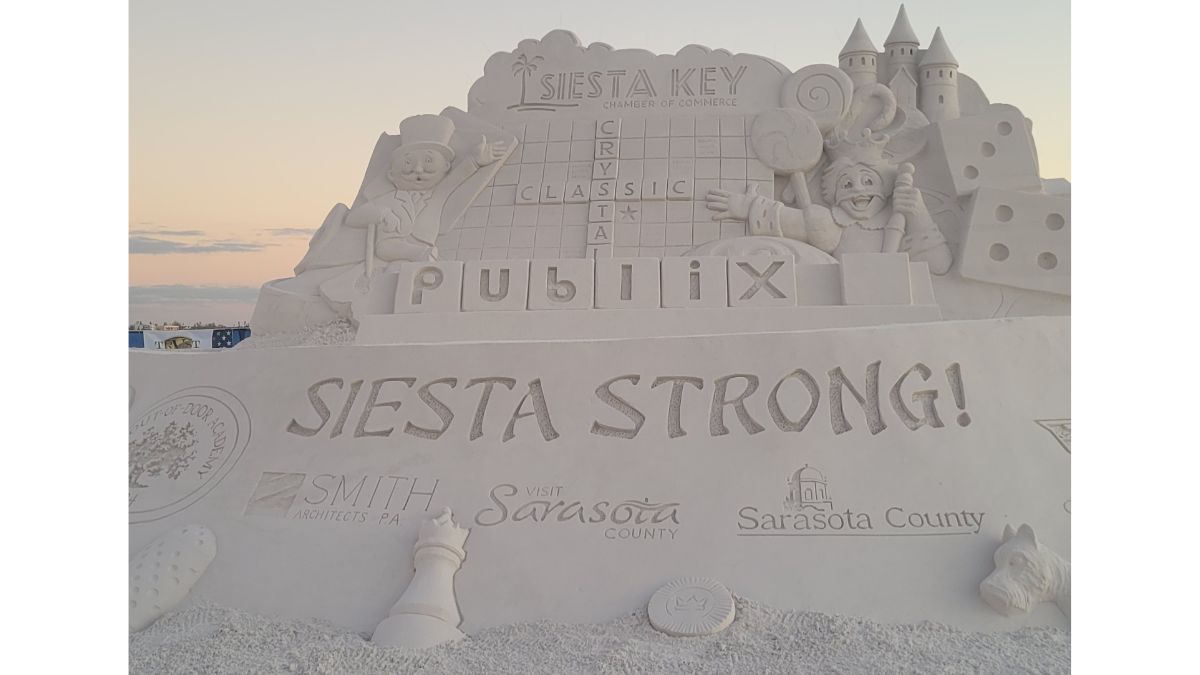 Sand sculpture at the Crystal Sands Classic on Siesta Key Beach in Sarasota, Florida — symbolizing the art of healing through the ONE Technique.